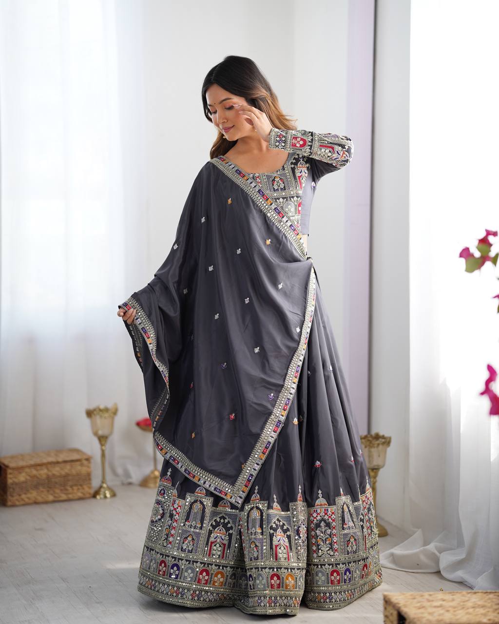 Majestic Midnight Black Designer Lehenga Choli Featuring Intricate Multicolored Architectural Embroidery and Mirror Work